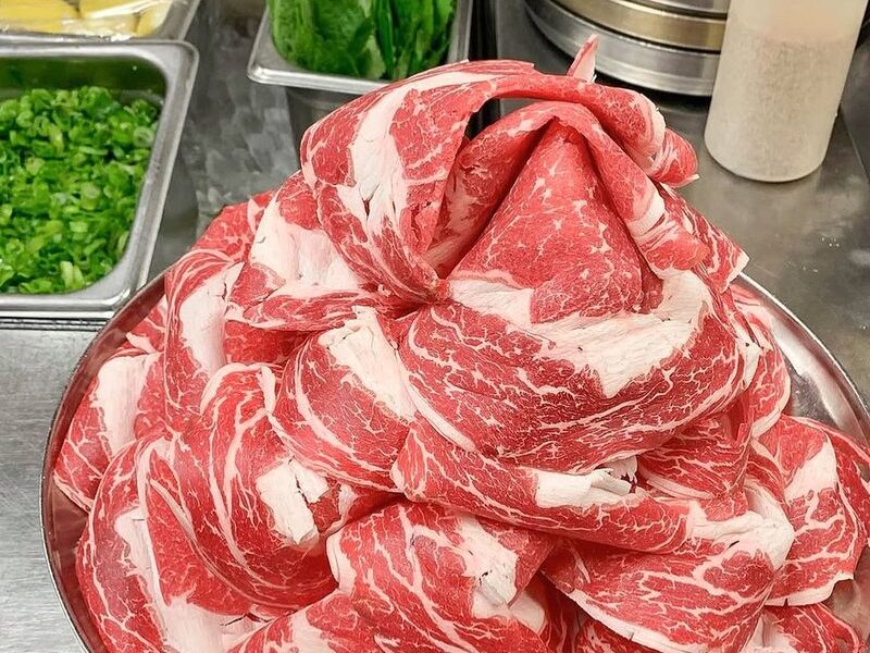 A share portion of thin-sliced prime rib at Mokkoji Irvine