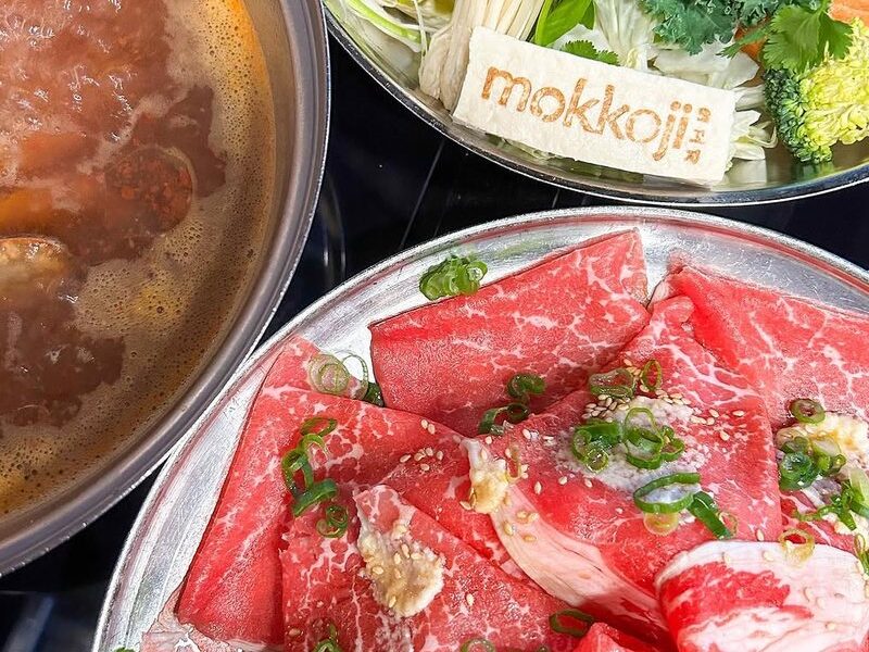 A Mokkoji shabu shabu set with beef, vegetables and broth