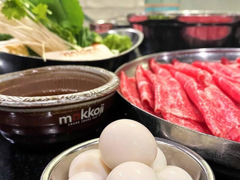 Quail eggs served with a shabu shabu set at Mokkoji